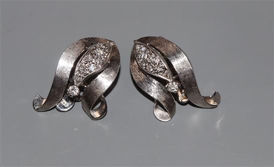 A modern pair of 18ct white metal and diamond set earclips, 29mm, gross 11.2 grams.